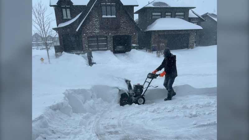 Larry Hrycan clearing snow from his driveway in the Willowgrove neighbourhood of Saskatoon on Sunday. (Courtesy: Karen Hrycan)