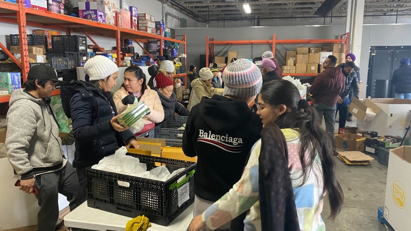 Volunteers pack hampers at the Sikhs for Humanity food bank in southeast Edmonton on March 3, 2024. (Miriam Valdes-Carletti/CTV News Edmonton)