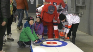 The Celebrate Saskatchewan event at the Montana's Brier sought to show off what the province has to offer while giving younger visitors a chance to try out some curling. (Hallee Mansryk/CTV News)