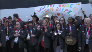 Special Olympics athletes celebrate their return home in Barrie, Ont. on Sun. March 3, 2024. (Mike Lang/CTV News)