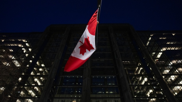 The Bank of Canada is seen at night, Wednesday, February 21, 2024 in Ottawa (Adrian Wyld / THE CANADIAN PRESS)
