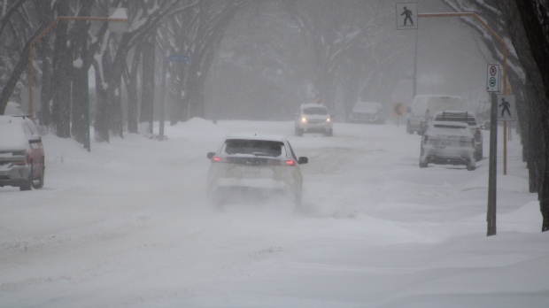 Traffic on Regina's snowy streets Sunday, March 3, 2024 during a winter storm that affected much of the province. (DavidPrisciak/CTVNews) 