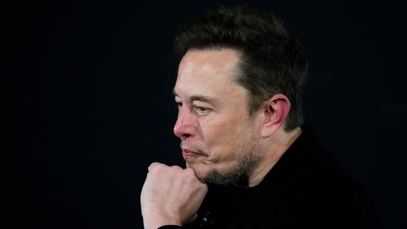 Tesla and SpaceX's CEO Elon Musk pauses during an in-conversation event with Britain's Prime Minister Rishi Sunak in London, Thursday, Nov. 2, 2023. (AP Photo/Kirsty Wigglesworth, Pool)