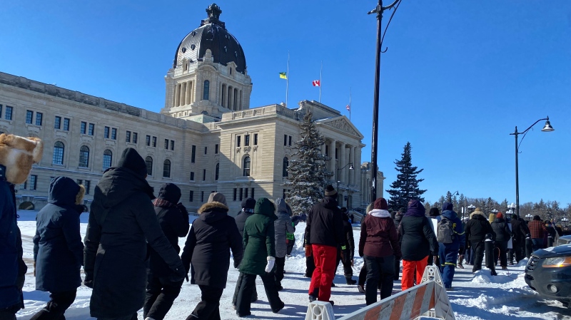 Teachers picket in front of the Saskatchewan Legislative Building on March 4, 2024. (Cole Davenport/CTV News)