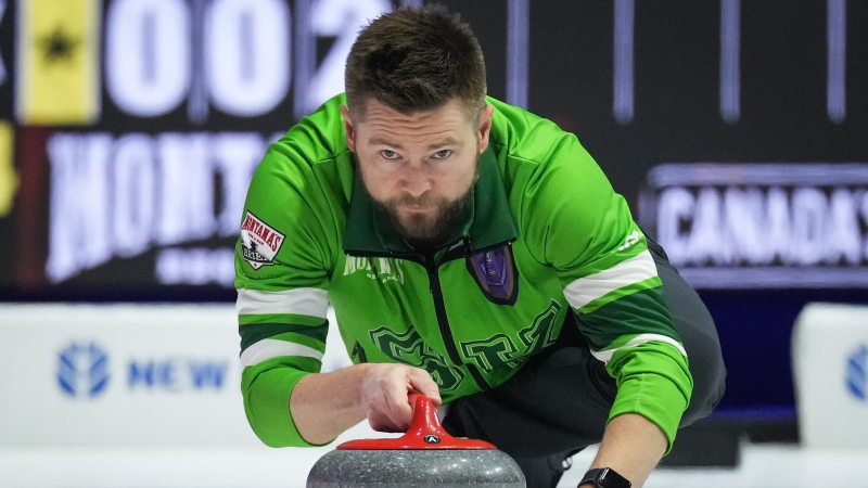 Saskatchewan skip Mike McEwen delivers a rock while playing Team Alberta-Koe during the Brier, in Regina, on Sunday, March 3, 2024. THE CANADIAN PRESS/Darryl Dyck