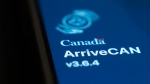 Canada's ArriveCAN app log in screen is seen on a mobile device, Monday, Feb. 12, 2024 in Ottawa. THE CANADIAN PRESS/Adrian Wyld 