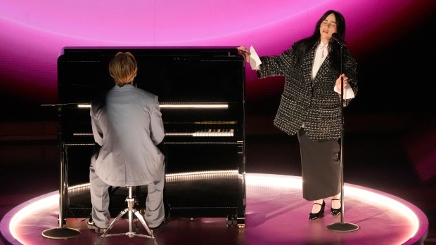 Finneas, left, and Billie Eilish perform 'What Was I Made For?' from 'Barbie' during the Oscars on Sunday, March 10, 2024, at the Dolby Theatre in Los Angeles. (AP Photo/Chris Pizzello)