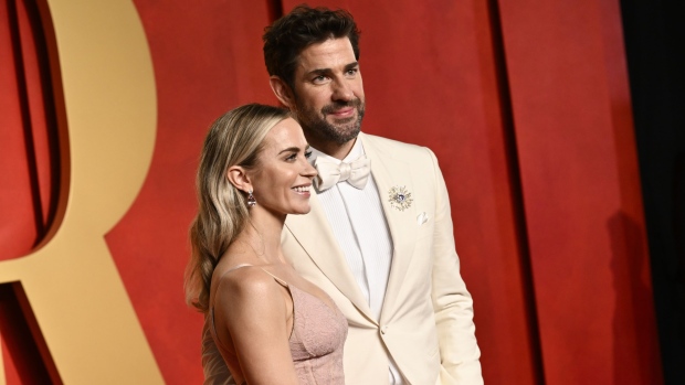 Emily Blunt, left, and John Krasinski arrive at the Vanity Fair Oscar Party on Sunday, March 10, 2024, at the Wallis Annenberg Center for the Performing Arts in Beverly Hills, Calif. (Photo by Evan Agostini/Invision/AP)