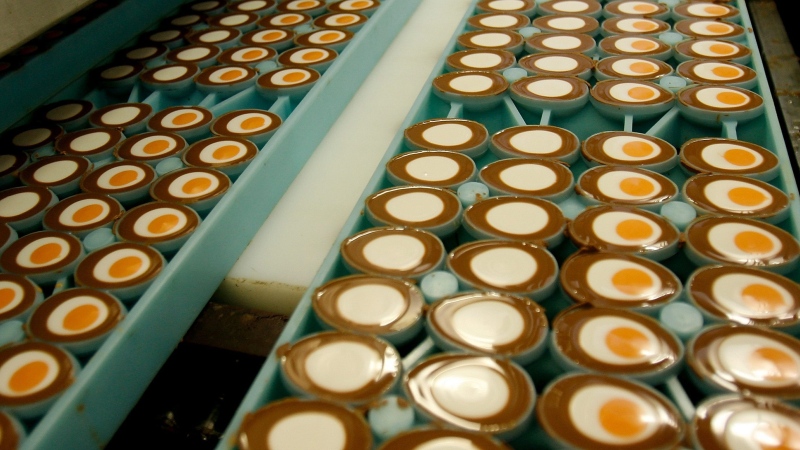 Cadbury Creme eggs move down the production line at the Cadburys factory in Birmingham, England. (AP Photo/Simon Dawson)