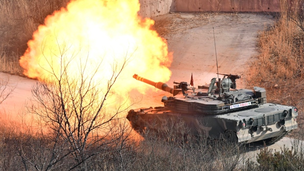 A South Korean K1A2 tank fires during a live fire exercise at a military training field in Pocheon Thursday, March 14, 2024. (Jung Yeon-je/AP)