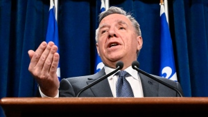 Quebec Premier Francois Legault comments on the provincial budget during a news conference, Wednesday, March 13, 2024 at the legislature in Quebec City. THE CANADIAN PRESS/Jacques Boissinot
