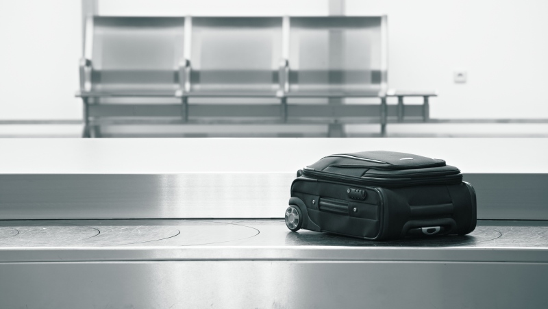 A suitcase is seen in on a luggage carousel in this undated photo. (Shutterstock)