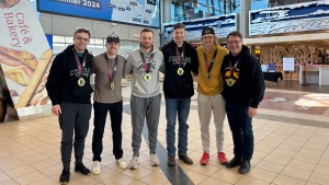 The University of Regina men’s curling team returned home from Fredericton on Saturday. (Hallee Mandryk / CTV News) 
