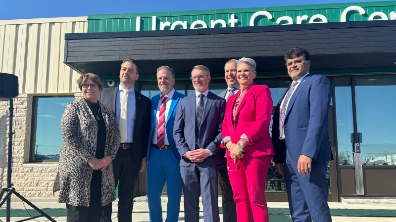 Officials gather in front of Regina's new Urgent Care Centre following a funding announcement on March 18, 2024. (Hallee Mandryk/CTV News)