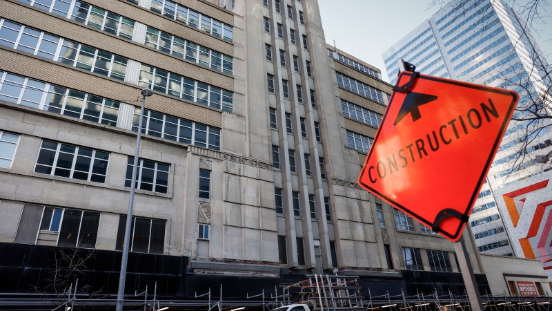 A construction sign outside the Barron Building in Calgary, Tuesday, Dec. 12, 2023. (THE CANADIAN PRESS/Jeff McIntosh)