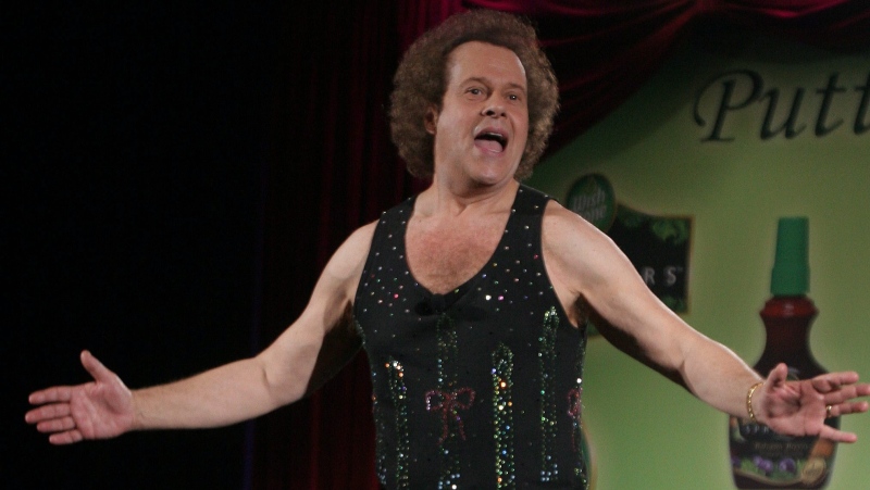 In this June 2, 2006, file photo, Richard Simmons speaks to the audience before the start of a summer salad fashion show at Grand Central Terminal in New York. (AP Photo / Tina Fineberg, File)