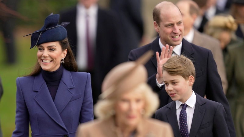 Britain's Kate, the Princess of Wales, William, the Prince of Wales, and Prince George arrive behind Queen Camilla to attend the Christmas day service at St Mary Magdalene Church in Sandringham in Norfolk, England, Monday, Dec. 25, 2023. (AP Photo/Kin Cheung) 