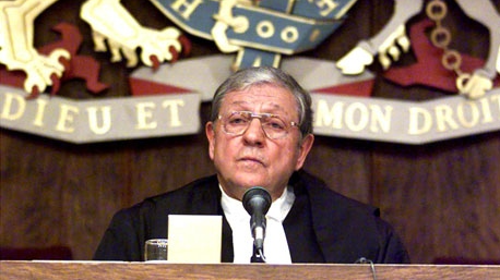 In this file photo, former Ontario Chief Justice Roy McMurtry addresses a meeting in Toronto, Monday, Jan.10, 2000 (Kevin Frayer / THE CANADIAN PRESS)

