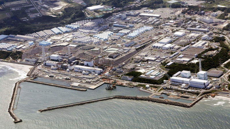 This aerial view shows the Fukushima Daiichi nuclear power plant in Fukushima, northern Japan, on Aug. 24, 2023, shortly after its operator Tokyo Electric Power Company Holdings TEPCO began releasing its first batch of treated radioactive water into the Pacific Ocean. Images taken by miniature drones from deep inside a badly damaged reactor at the Fukushima nuclear plant show displaced control equipment and misshapen materials but leave many questions unanswered, underscoring the daunting task of decommissioning the plant.(Kyodo News via AP, File)