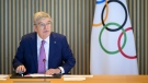 International Olympic Committee (IOC) President Thomas Bach speaks at the opening of the executive board meeting of the International Olympic Committee (IOC), at the Olympic House, in Lausanne, Switzerland, Tuesday, March 19, 2024. (Laurent Gillieron/Keystone via AP)