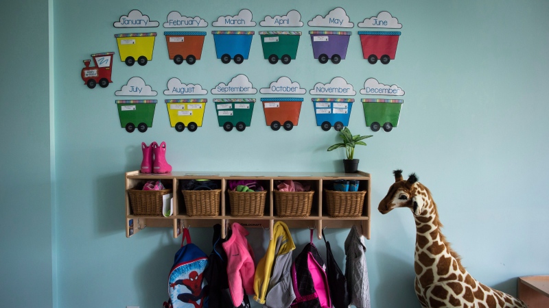 Children's backpacks and shoes are seen at an Early Learning daycare, in Langley, B.C., on May 29, 2018. THE CANADIAN PRESS/Darryl Dyck