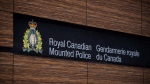 The RCMP logo is seen outside Royal Canadian Mounted Police 'E' Division Headquarters, in Surrey, B.C., on Friday, April 13, 2018. THE CANADIAN PRESS/Darryl Dyck
