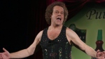 FILE - In this June 2, 2006, file photo, Richard Simmons speaks to the audience before the start of a summer salad fashion show at Grand Central Terminal in New York. Simmons told USA Today on June 5, 2016, that he was 'feeling great' after being hospitalized for dehydration. (AP Photo/Tina Fineberg, File)