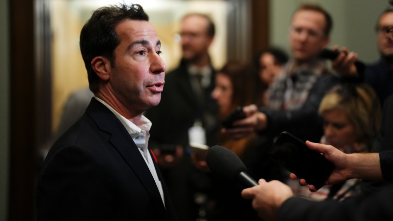 Liberal member of Parliament Anthony Housefather talks to reporters as he arrives to a caucus meeting in Ottawa on Wednesday, Nov. 8, 2023. (Sean Kilpatrick / The Canadian Press)