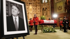 Sentinels stand guard as former prime minister Brian Mulroney lies in repose at St. Patrick's Basilica in Montreal on Thursday, March 21, 2024. (Ryan Remiorz/The Canadian Press)