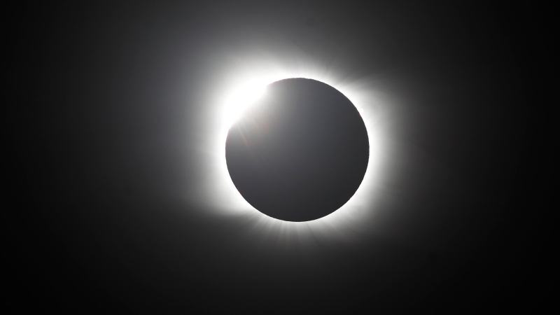 The moon covers the sun during a total solar eclipse in Piedra del Aguila, Argentina, Monday, Dec. 14, 2020. (AP Photo/Natacha Pisarenko)