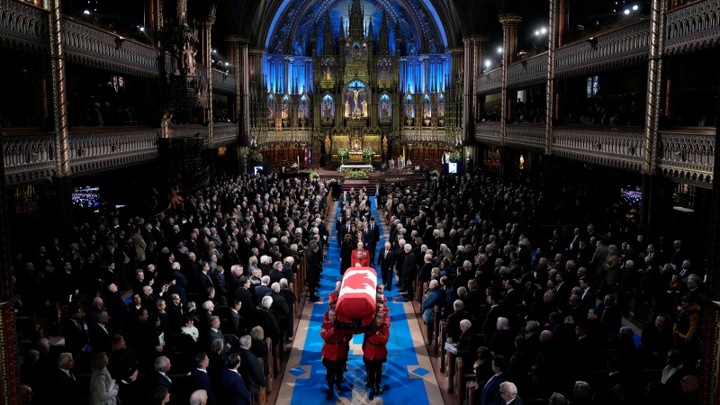 The casket is carried out at the end of the funeral of former prime minister Brian Mulroney, in Montreal, Saturday, March 23, 2024. THE CANADIAN PRESS/Adrian Wyld