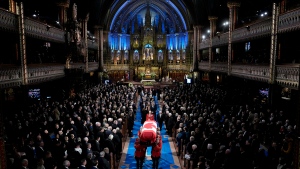The casket is carried out at the end of the funeral of former prime minister Brian Mulroney, in Montreal, Saturday, March 23, 2024. THE CANADIAN PRESS/Adrian Wyld
