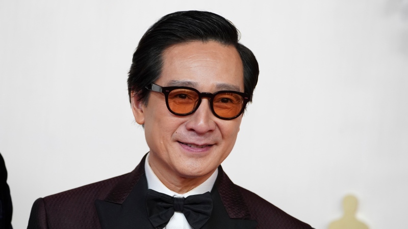 Ke Huy Quan arrives at the Oscars on Sunday, March 10, 2024, at the Dolby Theatre in Los Angeles. (Photo by Jordan Strauss/Invision/AP)