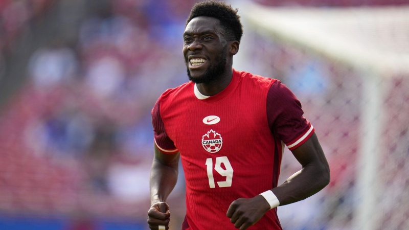 Canada forward Alphonso Davies (19) jogs up field after taking a shot against Trinidad And Tobago, Saturday, March 23, 2024, in Frisco, Texas. (Julio Cortez/AP Photo)