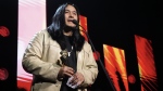 Aysanabee accepts the Juno Award for Songwriter of the Year at the 2024 Juno Awards. (Chris Young/The Canadian Press)
