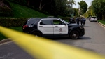 Police tape blocks a street in front of a property belonging to Sean "Diddy" Combs after federal law enforcement executed a raid on Monday, March 25, 2024, in Los Angeles. (AP Photo/Eric Thayer)