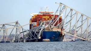 A view of the Dali cargo vessel which crashed into the Francis Scott Key Bridge, causing it to collapse in Baltimore, Maryland, on Tuesday, March 26. (Julia Nikhinson/Reuters via CNN Newsource)