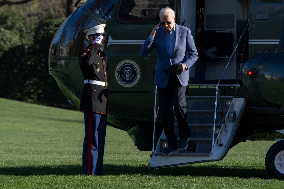 U.S. President Joe Biden salutes