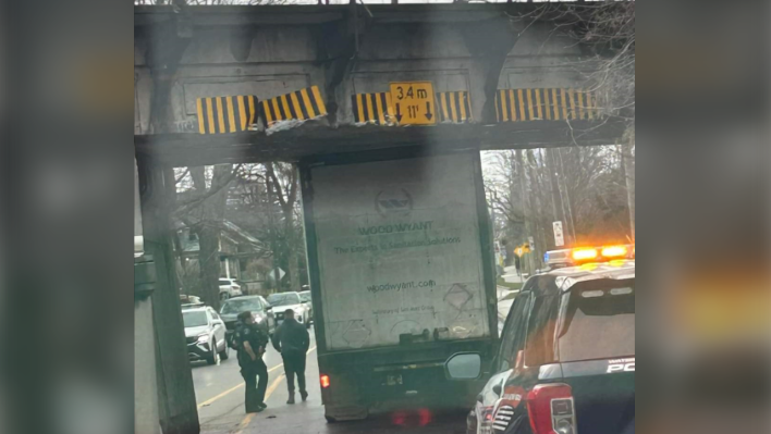 A truck stuck under the Park Street Bridge in Kitchener on March 26, 2024. (Credit: Terry)