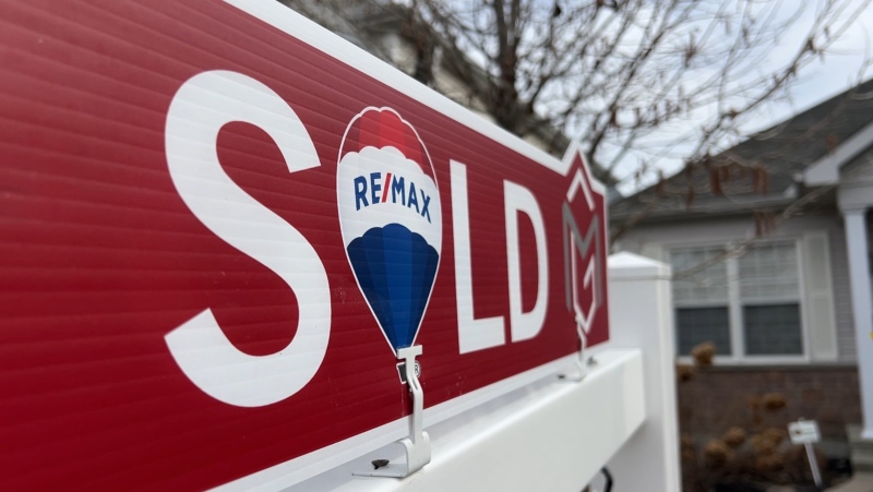 A home sold sign seen in Ottawa, Ont. Mar. 26, 2024. (Tyler Fleming / CTV News).
