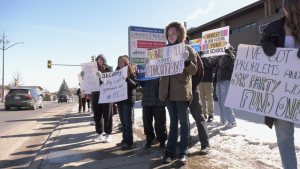 Saskatoon students protest the government's inability to reach a deal with teachers outside Sask. Party MLA Don Morgan's office on March 26, 2024. (Dan Shingoose / CTV News)
