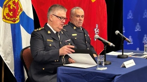 RCMP Assistant Commissioner Dennis Daley (left) and Commissioner Mike Duheme (right) are pictured in Millbrook, N.S., on MArch 27, 2024. (Jonathan MacInnis/CTV Atlantic)