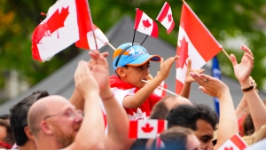 People enjoy Canada Day celebrations at LeBreton Flats in Ottawa on Friday July 1, 2022. (THE CANADIAN PRESS/Sean Kilpatrick)