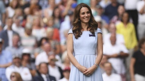 Kate, Princess of Wales, stands on centre court during the trophy presentation after Serbia's Novak Djokovic defeated Switzerland's Roger Federer during the men's singles final match of the Wimbledon Tennis Championships in London, Sunday, July 14, 2019. (Laurence Griffiths/Pool Photo via AP, File)