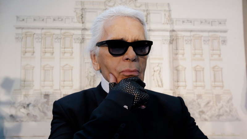 In this Monday, Jan. 28, 2013 file photo, Karl Lagerfeld poses for photographers prior to the start of a press conference, in Rome. (AP Photo / Gregorio Borgia, File)