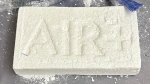 A brick of cocaine seized as part of a drug trafficking investigation in Edmonton. (Credit: Edmonton Police Service)