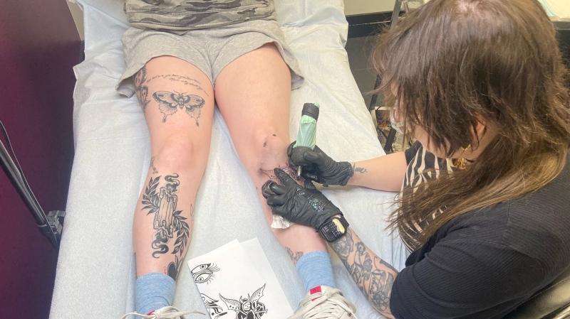 Tattoo work on a leg. (Source: Paul Hollingsworth/CTV News Atlantic)