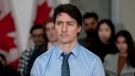Prime Minister Justin Trudeau listens to a speaker during a housing announcement in Vancouver, Wednesday, March 27, 2024. THE CANADIAN PRESS/Ethan Cairns