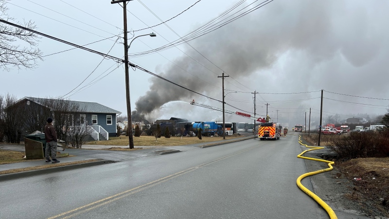 At least three fire departments were on scene after a fire destroyed Carabin’s bus garage on Wilson Road in Reserve Mines, N.S., Wednesday afternoon. (Ryan MacDonald/CTV Atlantic)
