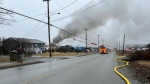 At least three fire departments were on scene after a fire destroyed Carabin’s bus garage on Wilson Road in Reserve Mines, N.S., on March 27, 2024. (Ryan MacDonald/CTV Atlantic)